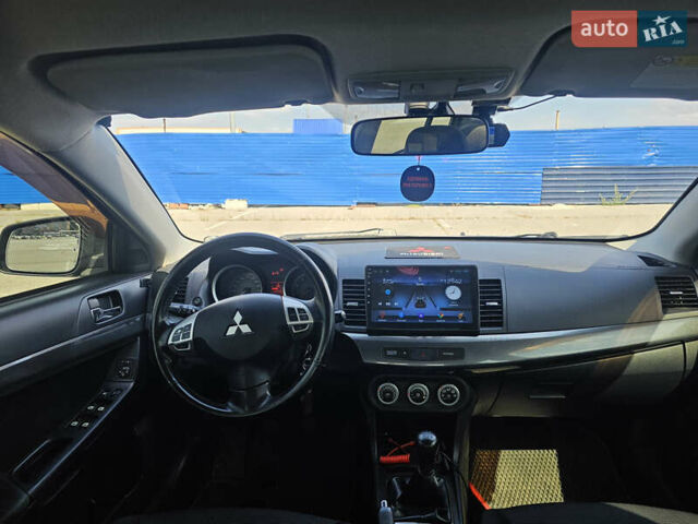 Чорний Міцубісі Lancer, об'ємом двигуна 2 л та пробігом 249 тис. км за 6500 $, фото 13 на Automoto.ua