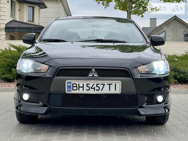 Чорний Міцубісі Lancer, об'ємом двигуна 2 л та пробігом 137 тис. км за 8750 $, фото 4 на Automoto.ua