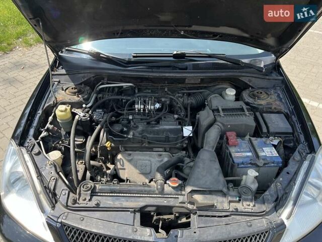 Чорний Міцубісі Lancer, об'ємом двигуна 1.6 л та пробігом 296 тис. км за 4200 $, фото 8 на Automoto.ua