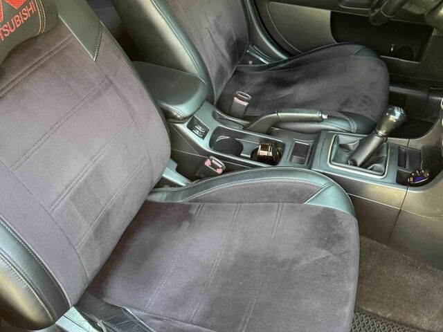 Чорний Міцубісі Lancer, об'ємом двигуна 2 л та пробігом 230 тис. км за 6650 $, фото 12 на Automoto.ua