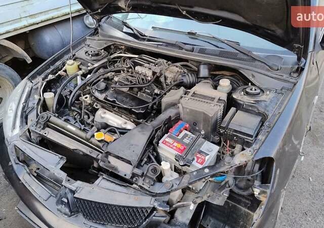 Черный Мицубиси Лансер, объемом двигателя 1.6 л и пробегом 200 тыс. км за 2000 $, фото 5 на Automoto.ua