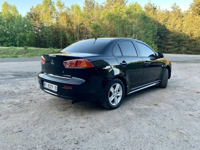 Чорний Міцубісі Lancer, об'ємом двигуна 2 л та пробігом 195 тис. км за 7000 $, фото 2 на Automoto.ua