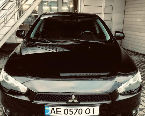 Черный Мицубиси Лансер, объемом двигателя 2 л и пробегом 200 тыс. км за 8000 $, фото 28 на Automoto.ua