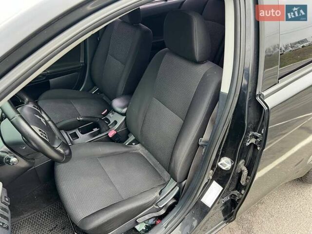 Черный Мицубиси Лансер, объемом двигателя 1.5 л и пробегом 225 тыс. км за 5100 $, фото 16 на Automoto.ua