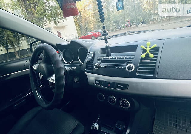 Чорний Міцубісі Lancer, об'ємом двигуна 2 л та пробігом 206 тис. км за 5600 $, фото 13 на Automoto.ua