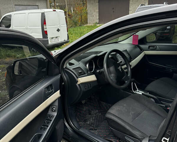 Черный Мицубиси Лансер, объемом двигателя 1.5 л и пробегом 278 тыс. км за 4200 $, фото 12 на Automoto.ua