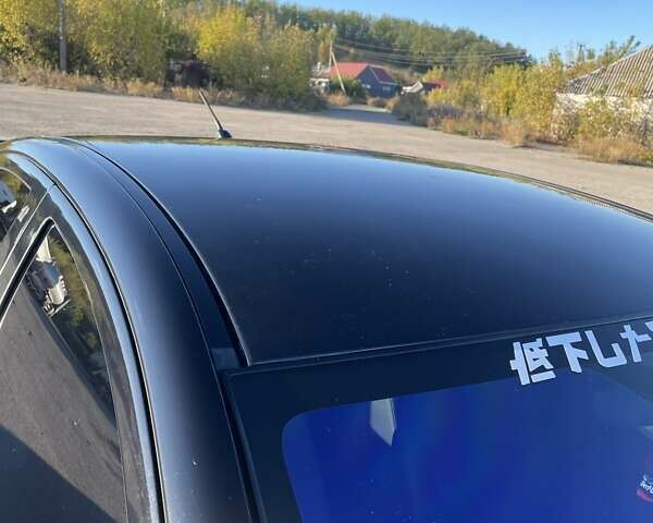 Чорний Міцубісі Lancer, об'ємом двигуна 2 л та пробігом 223 тис. км за 7800 $, фото 5 на Automoto.ua