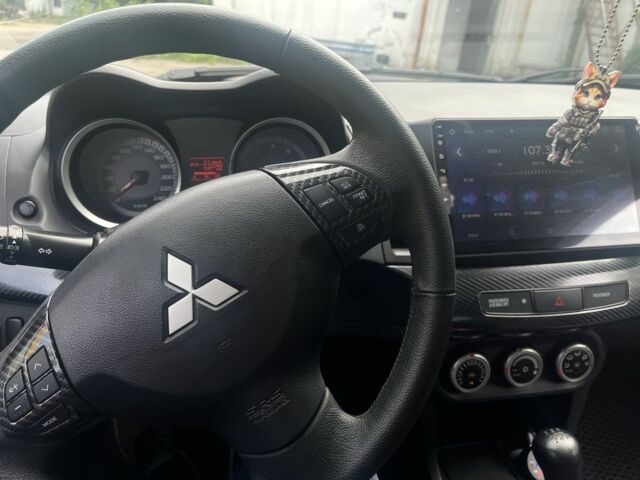 Чорний Міцубісі Lancer, об'ємом двигуна 2 л та пробігом 219 тис. км за 6800 $, фото 8 на Automoto.ua