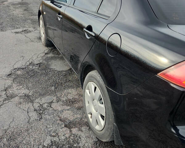 Чорний Міцубісі Lancer, об'ємом двигуна 1.5 л та пробігом 160 тис. км за 5850 $, фото 10 на Automoto.ua