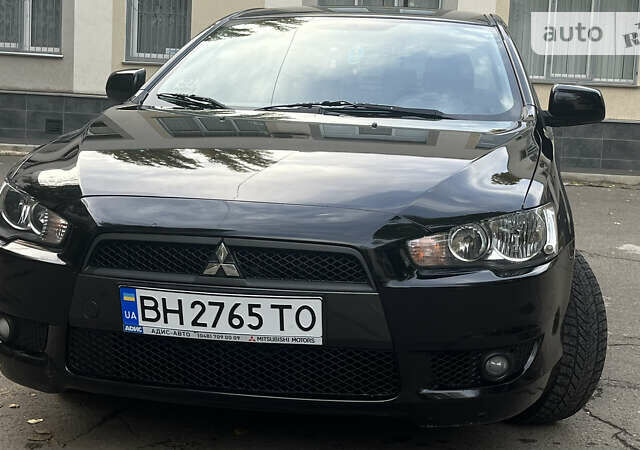 Чорний Міцубісі Lancer, об'ємом двигуна 2 л та пробігом 206 тис. км за 5600 $, фото 5 на Automoto.ua