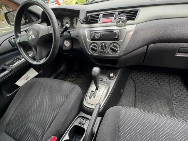 Чорний Міцубісі Lancer, об'ємом двигуна 1.6 л та пробігом 245 тис. км за 4500 $, фото 21 на Automoto.ua