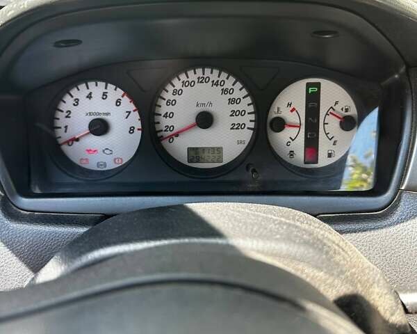 Чорний Міцубісі Lancer, об'ємом двигуна 1.6 л та пробігом 294 тис. км за 6500 $, фото 14 на Automoto.ua