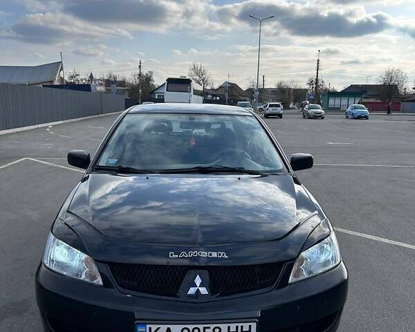 Чорний Міцубісі Lancer, об'ємом двигуна 1.6 л та пробігом 310 тис. км за 3500 $, фото 27 на Automoto.ua