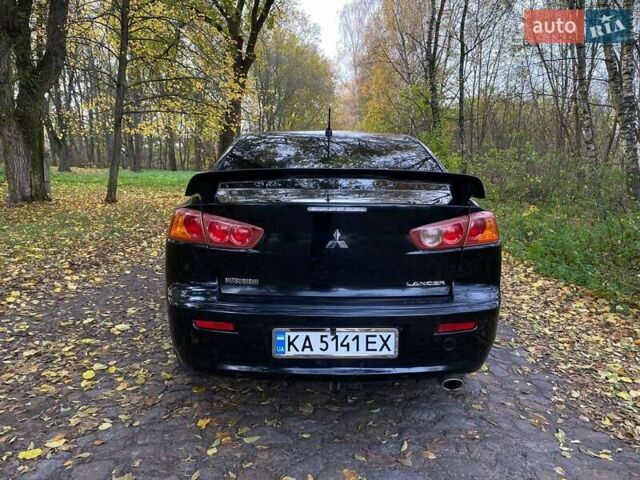 Чорний Міцубісі Lancer, об'ємом двигуна 2 л та пробігом 237 тис. км за 7500 $, фото 6 на Automoto.ua