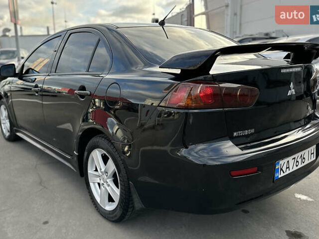 Чорний Міцубісі Lancer, об'ємом двигуна 2 л та пробігом 290 тис. км за 5900 $, фото 14 на Automoto.ua
