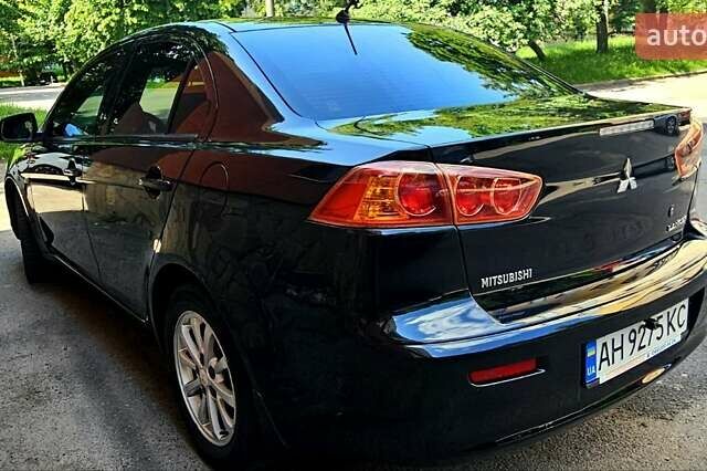 Черный Мицубиси Лансер, объемом двигателя 1.5 л и пробегом 205 тыс. км за 6300 $, фото 4 на Automoto.ua