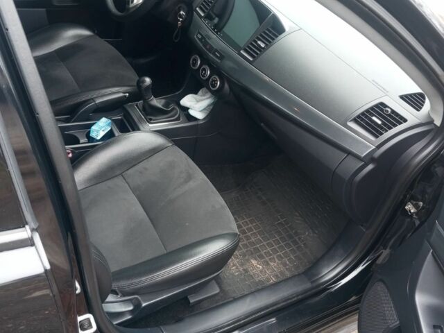 Чорний Міцубісі Lancer, об'ємом двигуна 2 л та пробігом 232 тис. км за 5000 $, фото 2 на Automoto.ua