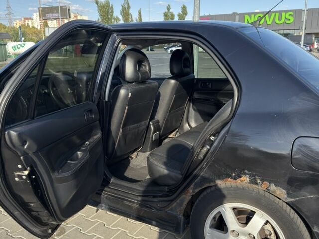 Чорний Міцубісі Lancer, об'ємом двигуна 1.6 л та пробігом 364 тис. км за 3000 $, фото 8 на Automoto.ua