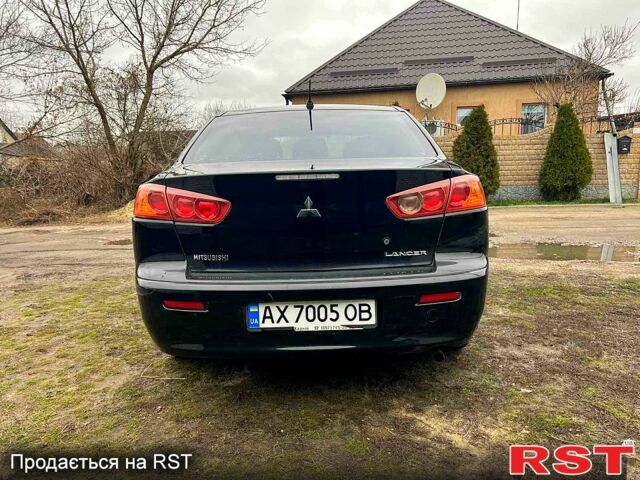 Чорний Міцубісі Lancer, об'ємом двигуна 1.5 л та пробігом 196 тис. км за 5900 $, фото 4 на Automoto.ua