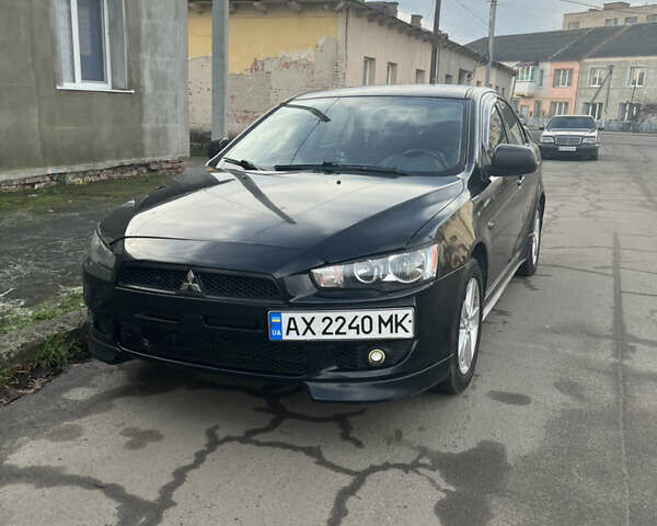 Черный Мицубиси Лансер, объемом двигателя 2 л и пробегом 270 тыс. км за 5400 $, фото 2 на Automoto.ua