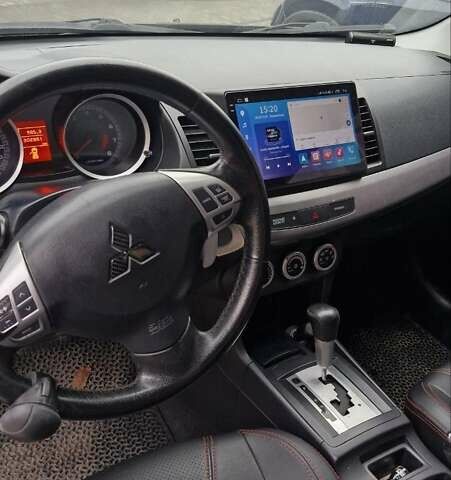 Чорний Міцубісі Lancer, об'ємом двигуна 2 л та пробігом 302 тис. км за 7200 $, фото 7 на Automoto.ua