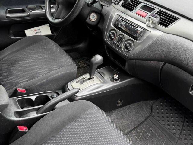Чорний Міцубісі Lancer, об'ємом двигуна 1.6 л та пробігом 245 тис. км за 4500 $, фото 22 на Automoto.ua