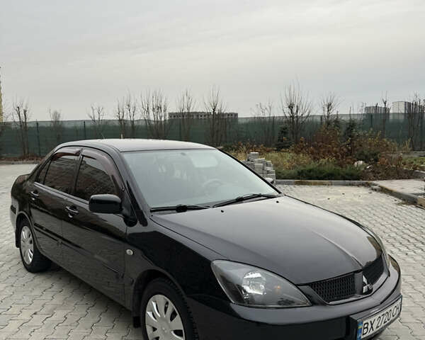 Черный Мицубиси Лансер, объемом двигателя 1.6 л и пробегом 240 тыс. км за 5200 $, фото 10 на Automoto.ua