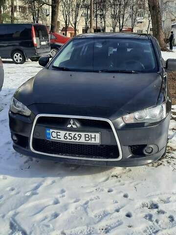 Чорний Міцубісі Lancer, об'ємом двигуна 2 л та пробігом 228 тис. км за 5500 $, фото 1 на Automoto.ua