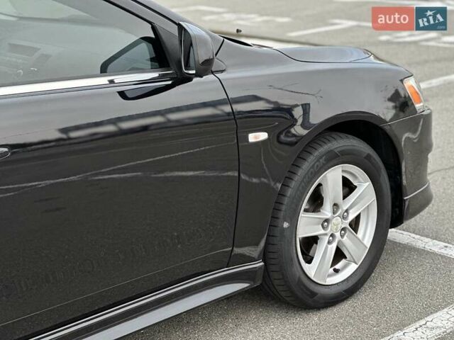Чорний Міцубісі Lancer, об'ємом двигуна 2 л та пробігом 199 тис. км за 7900 $, фото 5 на Automoto.ua