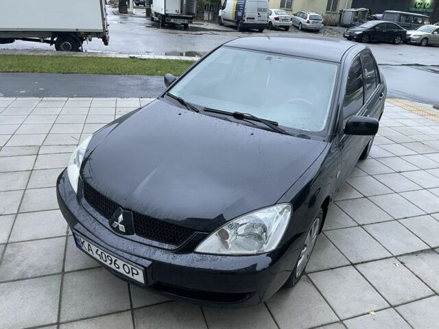 Черный Мицубиси Лансер, объемом двигателя 1.6 л и пробегом 226 тыс. км за 3750 $, фото 15 на Automoto.ua