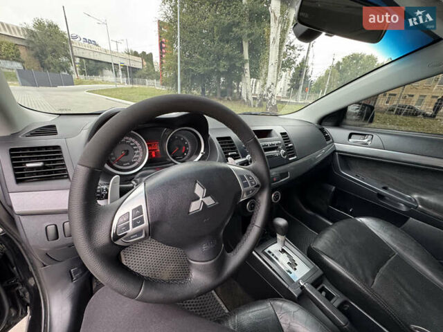 Чорний Міцубісі Lancer, об'ємом двигуна 2 л та пробігом 200 тис. км за 6800 $, фото 6 на Automoto.ua