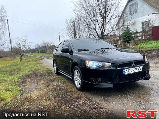 Черный Мицубиси Лансер, объемом двигателя 2 л и пробегом 226 тыс. км за 6600 $, фото 5 на Automoto.ua