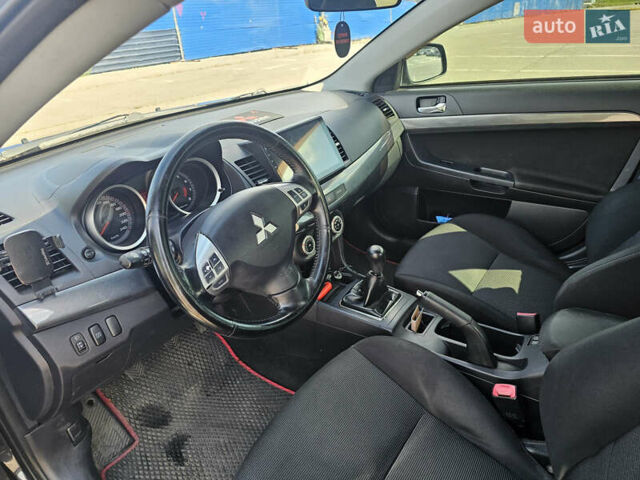 Чорний Міцубісі Lancer, об'ємом двигуна 2 л та пробігом 249 тис. км за 6500 $, фото 14 на Automoto.ua