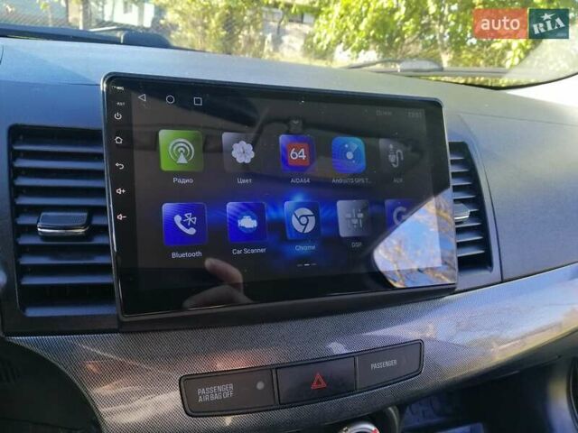 Мицубиси Лансер 2008 в Киеве на Automoto.ua Черный Мицубиси Лансер, объемом двигателя 2 л и пробегом 196 тыс. км за 5500 $, фото 13 на Automoto.ua