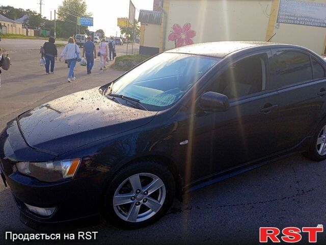 Черный Мицубиси Лансер, объемом двигателя 2 л и пробегом 156 тыс. км за 7100 $, фото 9 на Automoto.ua