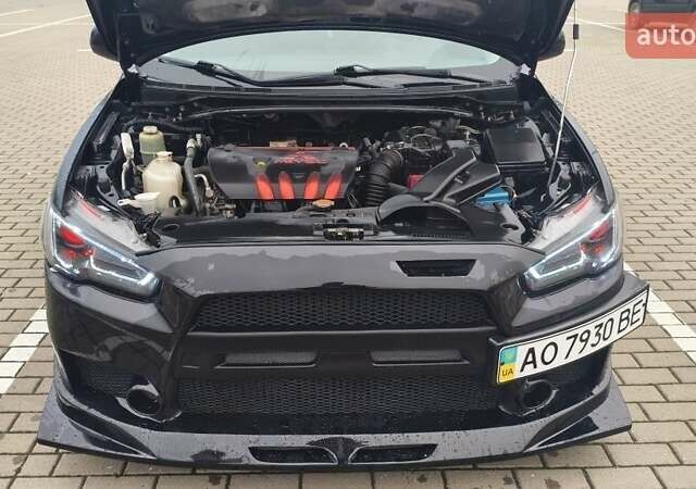 Чорний Міцубісі Lancer, об'ємом двигуна 2 л та пробігом 160 тис. км за 8000 $, фото 3 на Automoto.ua