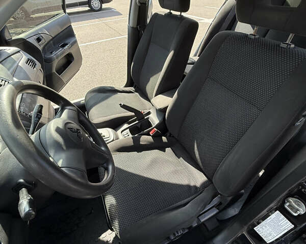 Черный Мицубиси Лансер, объемом двигателя 1.6 л и пробегом 321 тыс. км за 5000 $, фото 29 на Automoto.ua