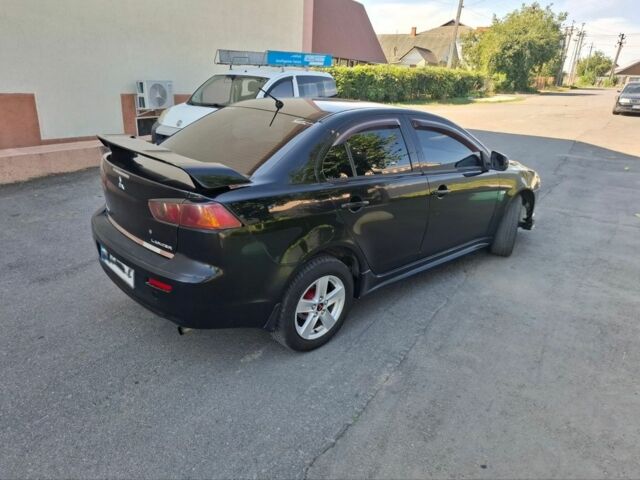 Чорний Міцубісі Lancer, об'ємом двигуна 2 л та пробігом 230 тис. км за 6650 $, фото 4 на Automoto.ua