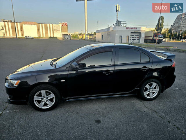 Чорний Міцубісі Lancer, об'ємом двигуна 2 л та пробігом 249 тис. км за 6500 $, фото 9 на Automoto.ua