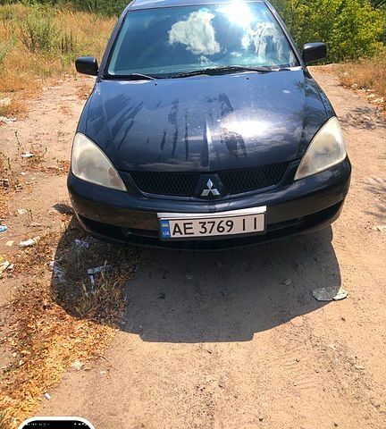 Чорний Міцубісі Lancer, об'ємом двигуна 1.6 л та пробігом 245 тис. км за 3200 $, фото 3 на Automoto.ua