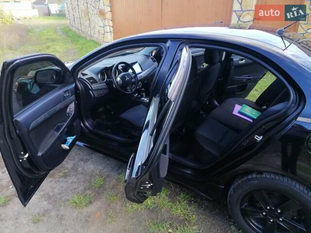 Мицубиси Лансер 2008 в Киеве на Automoto.ua Черный Мицубиси Лансер, объемом двигателя 2 л и пробегом 196 тыс. км за 5500 $, фото 20 на Automoto.ua