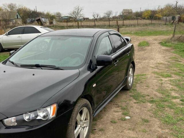 Чорний Міцубісі Lancer, об'ємом двигуна 2 л та пробігом 180 тис. км за 7500 $, фото 4 на Automoto.ua