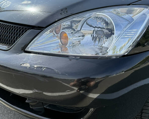 Черный Мицубиси Лансер, объемом двигателя 1.6 л и пробегом 321 тыс. км за 5000 $, фото 8 на Automoto.ua