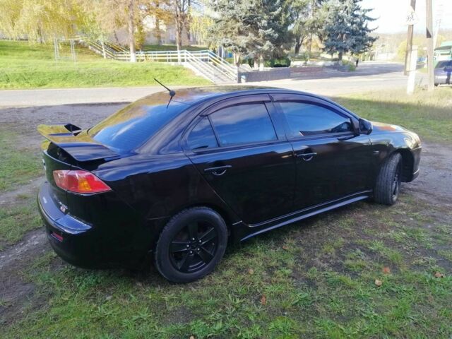 Міцубісі Lancer 2008 у Києві на Automoto.ua Чорний Міцубісі Lancer, об'ємом двигуна 2 л та пробігом 196 тис. км за 5500 $, фото 1 на Automoto.ua