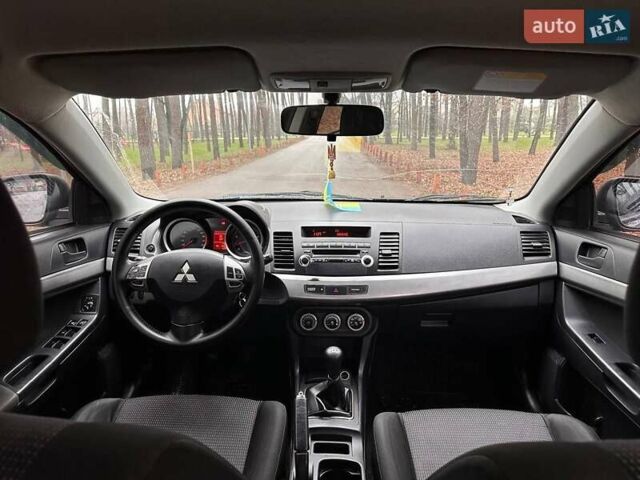 Чорний Міцубісі Lancer, об'ємом двигуна 2 л та пробігом 263 тис. км за 5750 $, фото 10 на Automoto.ua