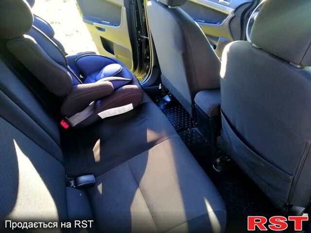 Черный Мицубиси Лансер, объемом двигателя 2 л и пробегом 196 тыс. км за 5500 $, фото 11 на Automoto.ua