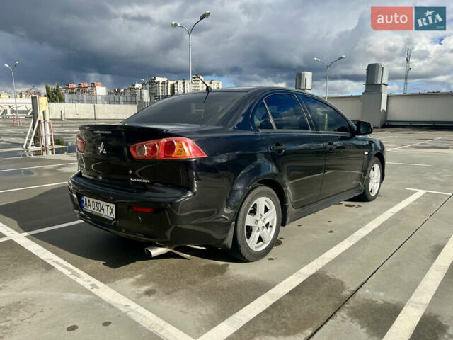 Мицубиси Лансер 2008 в Киеве на Automoto.ua Черный Мицубиси Лансер, объемом двигателя 2 л и пробегом 219 тыс. км за 6500 $, фото 4 на Automoto.ua