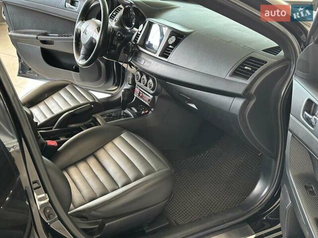 Чорний Міцубісі Lancer, об'ємом двигуна 2 л та пробігом 313 тис. км за 7690 $, фото 21 на Automoto.ua