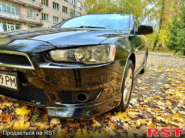 Чорний Міцубісі Lancer, об'ємом двигуна 2 л та пробігом 245 тис. км за 5500 $, фото 1 на Automoto.ua
