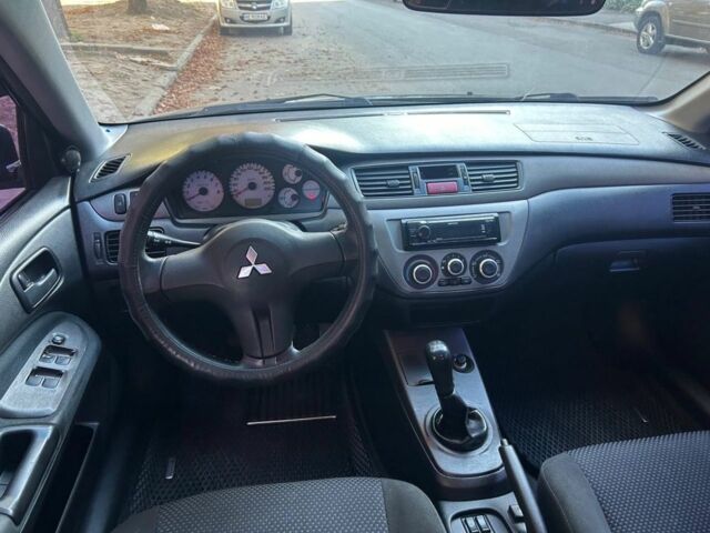 Міцубісі Lancer 2008 у Кривому Розі на Automoto.ua Чорний Міцубісі Lancer, об'ємом двигуна 1.6 л та пробігом 230 тис. км за 4380 $, фото 6 на Automoto.ua